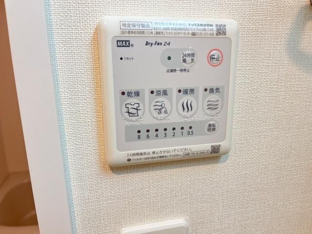 y̑ݔz@