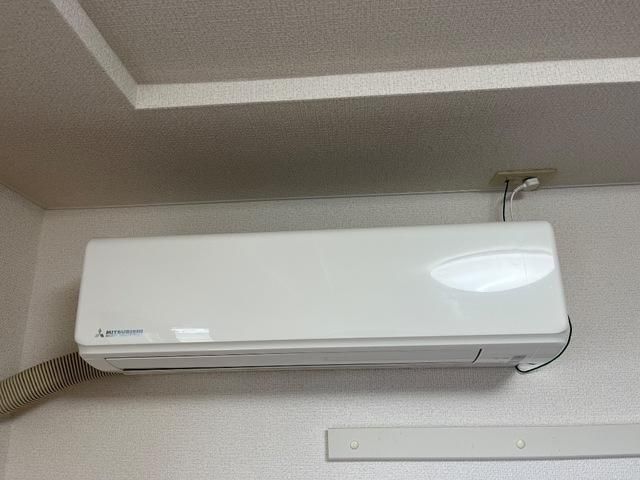 y̑ݔz@